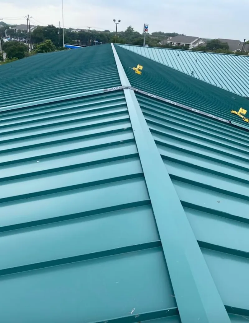 Green commercial metal roof ridge and valley for Metal Roof Repair in Satsuma